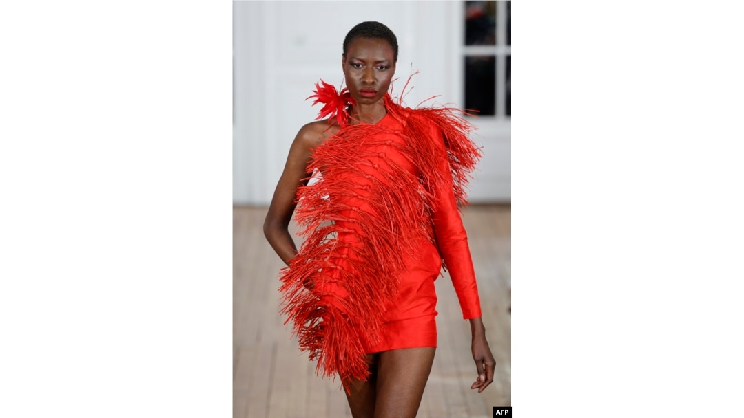 FILE - A model presents a creation for Imane Ayissi during the Women's Haute-Couture Spring/Summer 2024 Fashion Week in Paris on January 22, 2024.