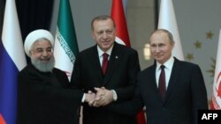 Les présidents turc Recep Tayyip Erdogan, russe Vladimir Poutine et iranien Hassan Rohani à Ankara, le 4 avril 2018.