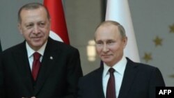 Le président turc Recep Tayyip Erdogan et son homologue russe Vladimir Poutine à Ankara, le 4 avril 2018.