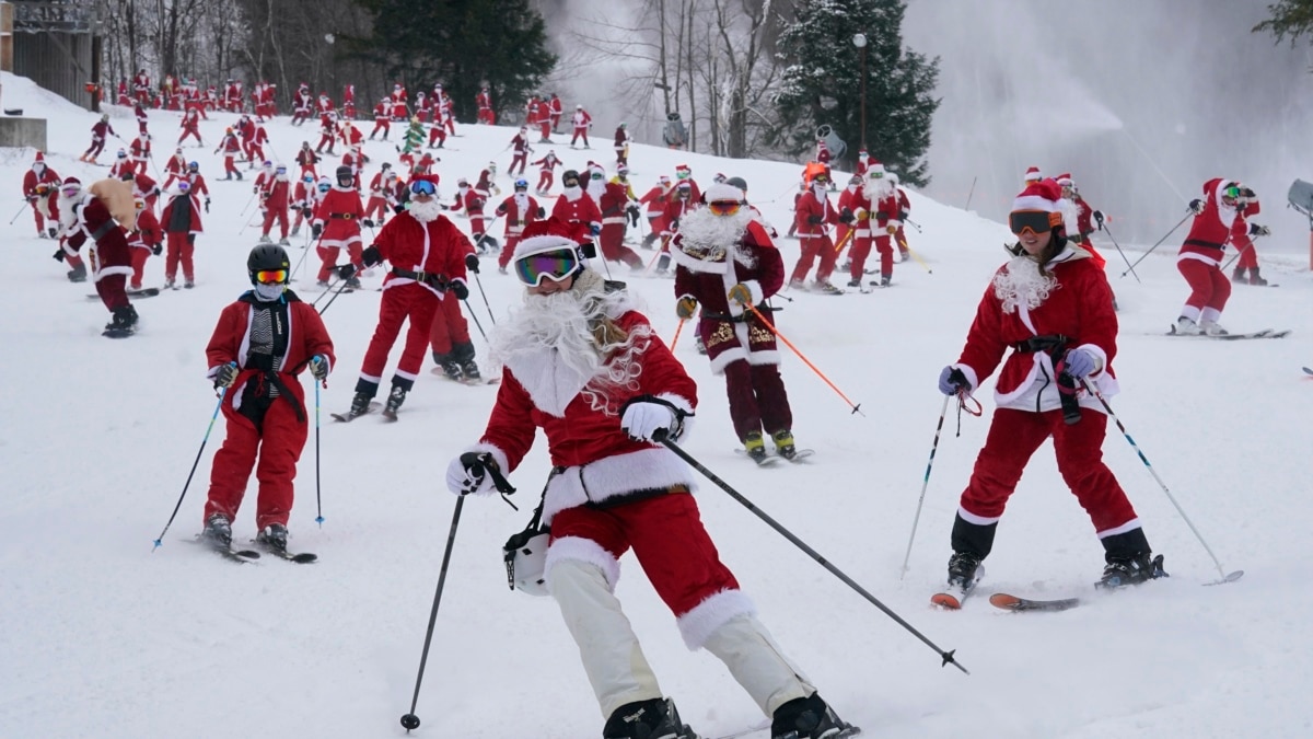 It's All Downhill for 300 Skiing Santas, a Grinch and a Tree