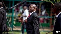 FILE - In this photo taken on July 1, 2015, Burundi's President Pierre Nkurunziza gestures as he arrives for celebrations of the country's 53rd Independence Anniversary at Prince Rwagasore Stadium in Bujumbura.
