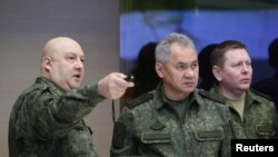 Russian Defence Minister Sergei Shoigu and General Sergei Surovikin visit the Joint Headquarters of the Russian armed forces, in an unknown location