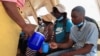 FILE - Cholera patients are rehydrated with salt and sugar solution at Kuwadzana Polyclinic in Harare, Zimbabwe, Nov. 24, 2023.