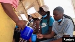 Cholera patients are rehydrated with salt and sugar solution at Kuwadzana Polyclinic in Harare, Zimbabwe November 24, 2023.