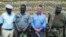 FILE - Ambassador Bruce Wharton at Naletale National Monument with Gweru mayor Hamutendi Kombayi (left) and Norbert Nhutsve (right), regional director of  National Museums and Monuments of Zimbabwe. (Photo/Taurai Shava)