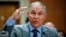 FILE - Environmental Protection Agency administrator Scott Pruitt testifies before the Senate Environment Committee on Capitol Hill in Washington, Jan. 30, 2018.