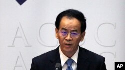 FILE - Chinese Ambassador to Australia, Cheng Jingye, gives a speech to a business forum in Australia's Parliament House in Canberra, June 19, 2018.