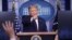 President Donald Trump points to a reporter for a question during a news briefing at the White House in Washington, July 21, 2020.
