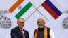 FILE - Russian President Vladimir Putin, left, and India's Prime Minister Narendra Modi attend the inauguration of World Diamond Conference in New Delhi, Dec. 11, 2014.