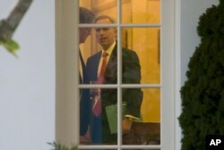 FILE - White House Counsel Pat Cipollone is seen during a meeting with President Donald Trump in the Oval Office of the White House, in Washington, Nov. 14, 2019.