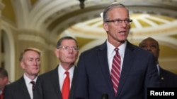 FILE - Republican U.S. Senator John Thune, who was elected to go  the adjacent  Senate bulk  leader, speaks to reporters connected  Capitol Hill successful  Washington, Nov. 13, 2024.