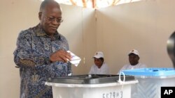 The ruling party CCM presidential candidate Dr. John Magufuli casts his vote at Chamwino in Dodoma, Oct. 28, 2020.