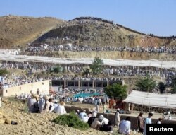 FILE - Tribesmen attend a religious congregation organized by Tablighi Jamaat in Miranshah, Pakistan, May 6, 2006. Militants fighting the Pakistani army in the region had distributed leaflets in the name of al-Qaida leader Osama bin Laden.