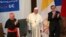 FILE - Pope Francis is pictured with Cardinal Ricardo Ezzati Andrello, left, at the Pontifical Catholic University of Chile in Santiago, Jan. 17, 2018.