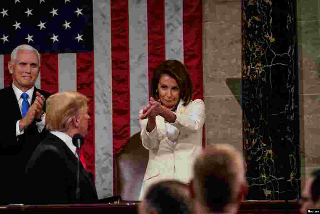 President Donald Trump arrives to deliver the State of the Union address, with Vice President Mike Pence and Speaker of the House Nancy Pelosi, at the Capitol in Washington, D.C., Feb. 5, 2019.