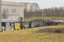 An Amazon data center across the street from a residential community in the town of Ashburn in Loudoun County, Virginia.