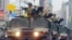 FILE - A fleet of Taiwanese military vehicles loading U.S.-made TOW anti-tank missiles rehearse for National Day celebrations in Taipei, Taiwan, Oct. 8, 2007. 