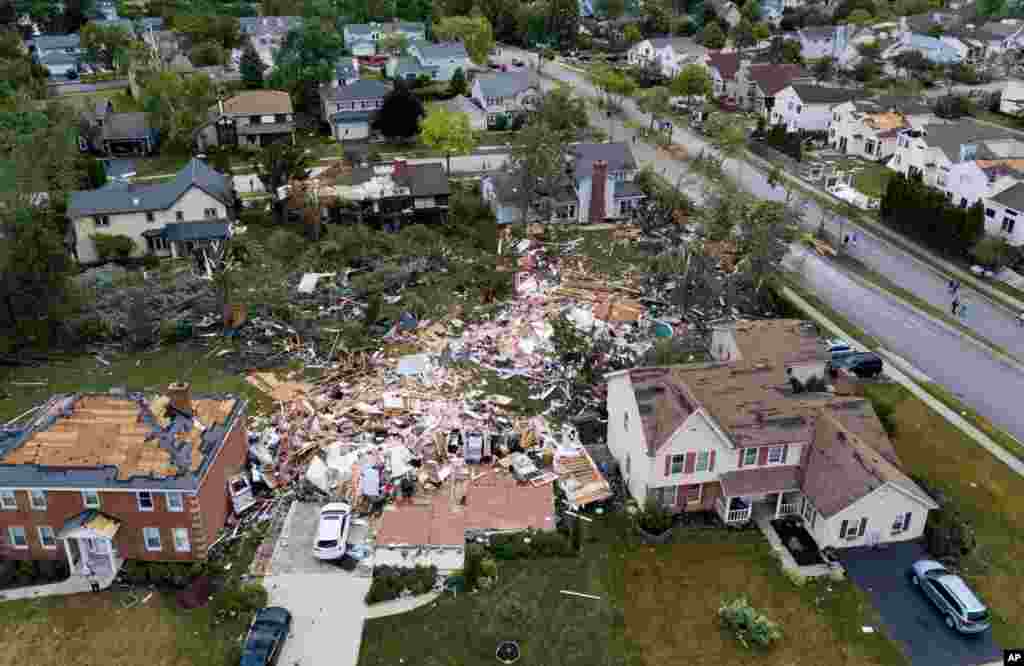 A home on the 1800 block of Princeton Circle is leveled after an overnight tornado swept through the area in Naperville, Illinois.