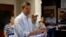 Kansas Secretary of State Kris Kobach and candidate for the Republican nomination for Kansas Governor addresses supporters during a campaign stop, Aug. 3, 2018, at the Fort Scott Livestock Market in Fort Scott, Kan. 