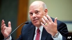 FILE - In this Aug. 24, 2020, photo, Postmaster General Louis DeJoy testifies during a House Oversight and Reform Committee hearing on the Postal Service on Capitol Hill in Washington.