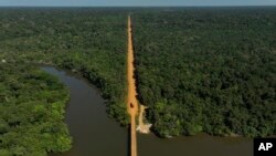(FILE) The trans-Amazon highway crosses the Assua River in Brazil.