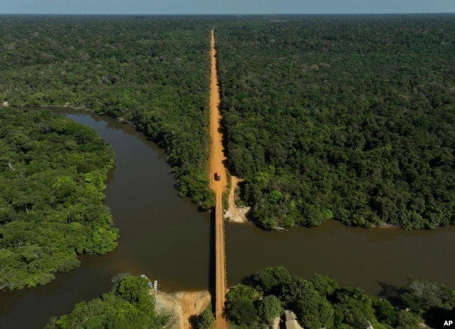 The trans-Amazon highway crosses the Assua River near the Juma Indigenous community near Canutama, Amazonas state, Brazil, Monday, July 10, 2023.