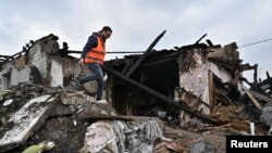 Развалины жилого дома, разрушенного в результате российского ракетного удара. Запорожье, 9 апреля 2023 г. 