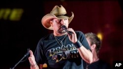 Country star Jason Aldean performs during a surprise pop up concert at the Music City Center in Nashville, Tenn., June 7, 2017.