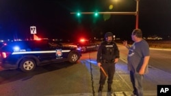 A State Patrol officer blocks the road in front of the Oneida Bingo and Casino in Green Bay, Wis on Saturday May 1, 2021 after reports of an active shooter. A spokesperson for a Wisconsin casino says an undetermined number of people have been shot at the…