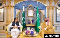 FILE - Pakistan's Prime Minister Imran Khan meets with Saudi Arabia's Crown Prince Mohammed bin Salman, in Jeddah, Saudi Arabia, Sept. 19, 2019.