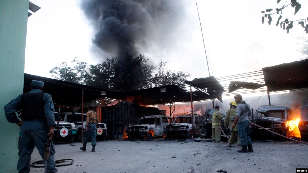 Afghan policemen keep watch at ICRC compound, Jalalabad province, May 29, 2013.