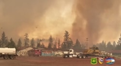 Se forma un tornado de fuego en el incendio Tennant Fire en el Bosque Nacional de Klamath, en Macdoel, California, EE.UU. el 12 de julio de 2021.