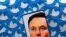 FILE PHOTO: Illustration shows Elon Musk image on smartphone and printed Twitter logos