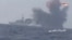 An explosion is seen onboard what is believed to be a Saudi warship, off the western coast of Yemen in this still frame taken from video posted by Houthi-run al-Masirah television on their social media website, and obtained by Reuters, Jan. 31, 2017.