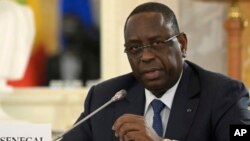 FILE — Senegal's President Macky Sall speaks during a meeting with Russian President Vladimir Putin in St. Petersburg, Russia, June 17, 2023.