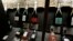 Bottles of Champagne are displayed at Dilettantes wine shop in Paris, France, Dec. 31, 2015. 