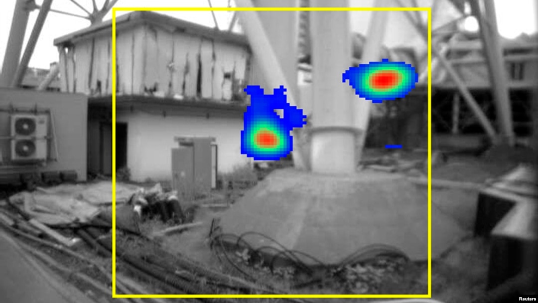 Tokyo Electric Power Company's image taken by a gamma ray camera showing the bottom of a ventilation stack standing between Fukushima Daiichi nuclear power plant's No.1 and No.2 reactors, where radiation exceeding 10 sieverts per hour was found as shown in red, in Fukushima prefecture, northern Japan, July 31, 2011.