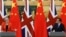 FILE - British Prime Minister Theresa May speaks during a joint press conference with Chinese Premier Li Keqiang at the Great Hall of the People in Beijing, China, Jan. 31, 2018. 