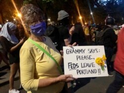 Mardy Widman, a 79-year-old grandmother of five, protests the presence of federal agents outside the Mark O. Hatfield Federal Courthouse in Portland, Oregon, July 20, 2020.