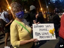 Mardy Widman, a 79-year-old grandmother of five, protests the presence of federal agents outside the Mark O. Hatfield Federal Courthouse in Portland, Oregon, July 20, 2020.