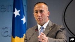 FILE - Kosovo Prime Minister Ramush Haradinaj speaks to reporters in Pristina, Dec. 18, 2018. 