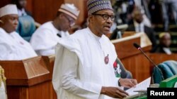 Nigeria's President Muhammadu Buhari presents the 2019 budget at the National Assembly in Abuja, Nigeria, Dec. 19, 2018. 