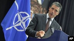 NATO Secretary General Anders Fogh Rasmussen speaks during a media conference at NATO headquarters in Brussels, Oct. 21, 2011.