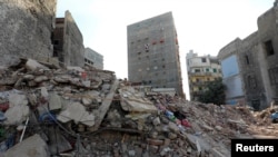 A view shows the site of a collapsed apartment building in Alexandria, Egypt, Dec. 3, 2020. 