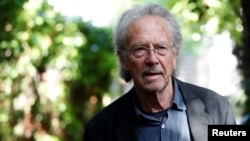 FILE - Austrian author Peter Handke is pictured at his house, following the announcement he won the 2019 Nobel Prize in Literature, in Chaville, near Paris, Oct. 10, 2019.