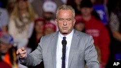 FILE - Robert F. Kennedy Jr., speaks earlier  Republican statesmanlike  nominee erstwhile  President Donald Trump astatine  a run  lawsuit   successful  Milwaukee, Nov. 1, 2024.