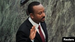 FILE - Ethiopia's Prime Minister Abiy Ahmed takes his oath during his incumbent ceremony at the Parliament building in Addis Ababa, Ethiopia, Oct. 4, 2021.