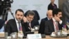 Syrian Interim Foreign Minister Asaad al-Shibani, left, attends the International Conference on Syria at the Ministerial Conference Center in Paris, Feb. 13, 2025.