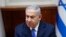 FILE - Israeli Prime Minister Benjamin Netanyahu chairs the weekly cabinet meeting in Jerusalem, March 3, 2019.