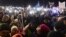 FILE - People take part in a street protest to show solidarity with judges facing increased political pressure from the country's right-wing government, in Warsaw, Poland, Dec. 1, 2019.